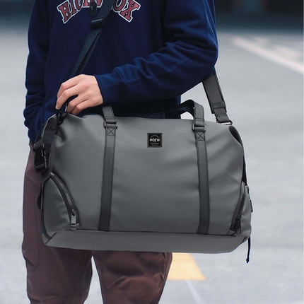 Bokken Travel Bag Large Capacity shown in grey, ideal for week-long trips with generous storage for clothes and toiletries.
