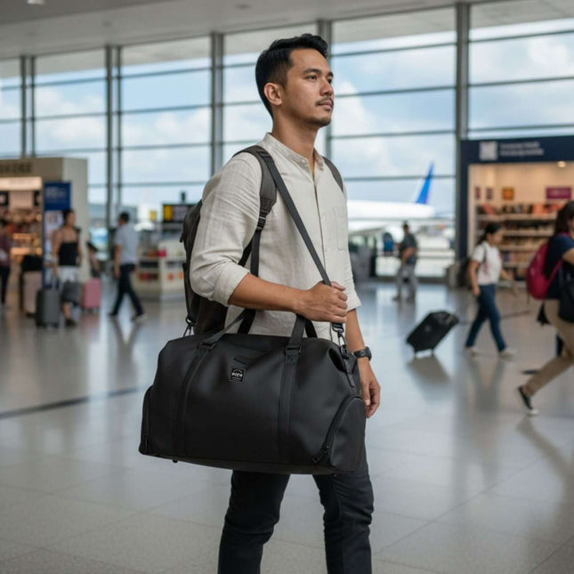 Man carrying Bokken Travel Bag Large Capacity at airport, ready for a week-long trip.