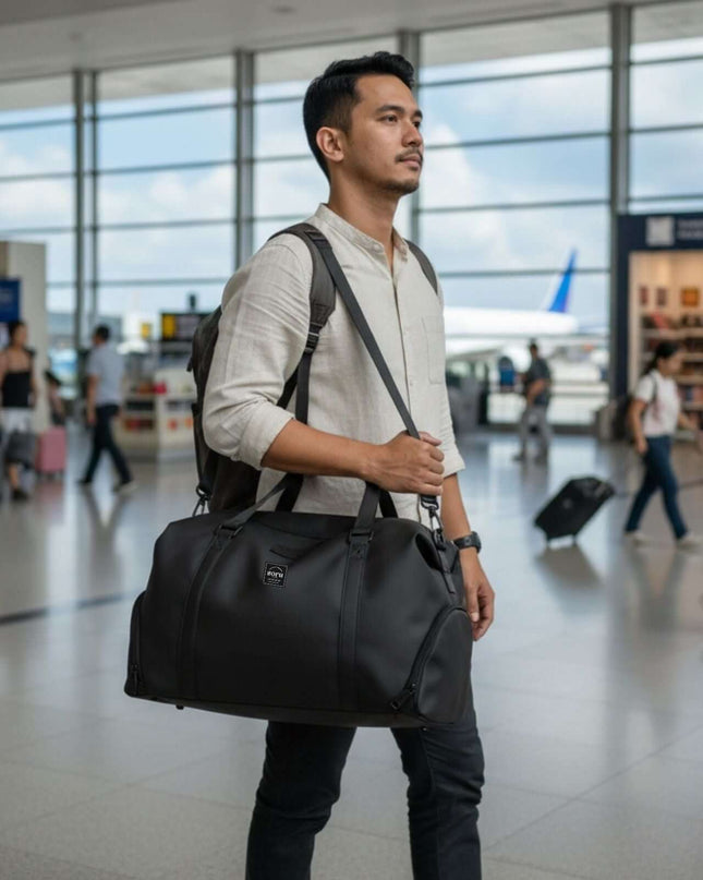 Man carrying Bokken Travel Bag Large Capacity at airport, ready for a week-long trip.
