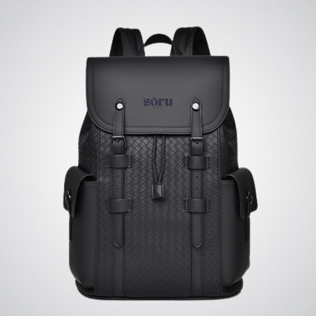 Black backpack with 'soru' branding on a light gray background