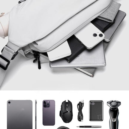 Noroi Cross Body Bag for Men Waterproof with tech gadgets and essentials inside.