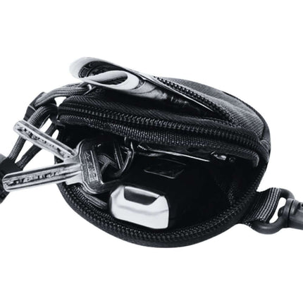 Every Day Carry (EDC) Tactical Pouch with keys and accessories inside.