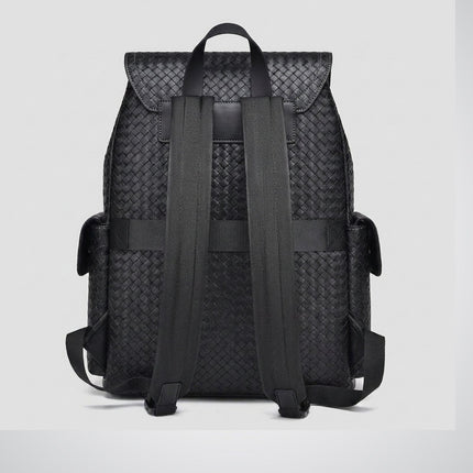 Black woven backpack on a light gray background