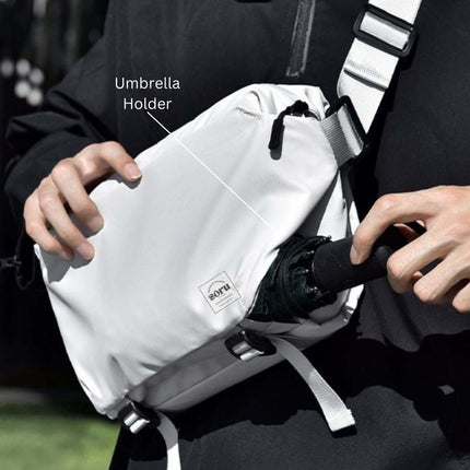 Noroi Shoulder Bag and Cross Body Bag with built-in umbrella holder, perfect for hands-free convenience.