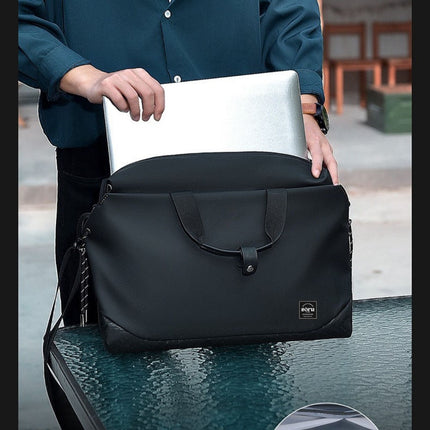 Person holding a black laptop bag with a silver laptop inside, standing by a pool.