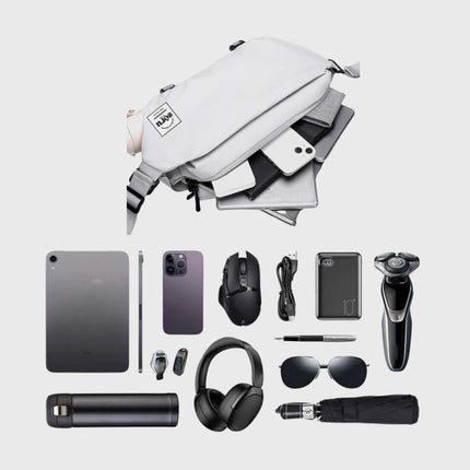 Noroi Shoulder Bag and Cross Body Bag filled with essentials like tech gadgets, a phone, and personal items.