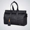 Limited Edition Kaze Woven Duffel Bag & Travel Bag in sleek black design with roll-top and ample storage.